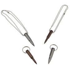 Two silver-handled tools with dark tips, two dark pins with rings.