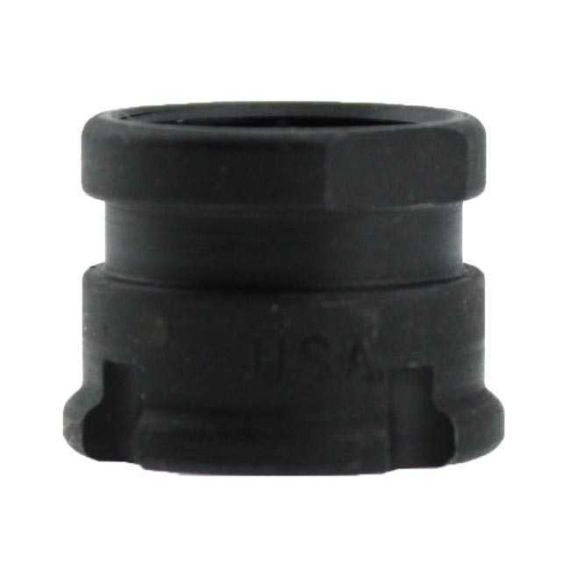 Angled close-up of AK-Builder Barrel Nut, dark finish, visible 14x1 LH threads, U.S.A. mark.