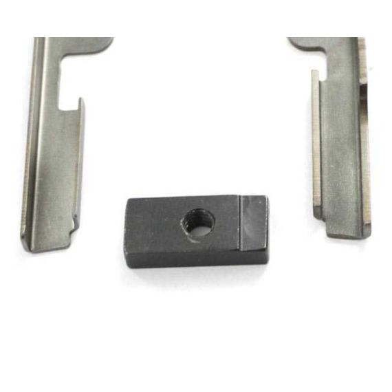 Close-up of AK-Builder fixture black oxide clamp block and in the white lower bolt guide rails.