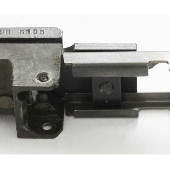 AK-Builder Rail Alignment Fixture, dark finished steel, clamping raw lower guide rails to trunnion.