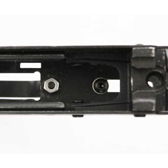 AK-Builder Saiga 12 trigger guard, black finished, overhead view, showing mounting and grip screw holes.