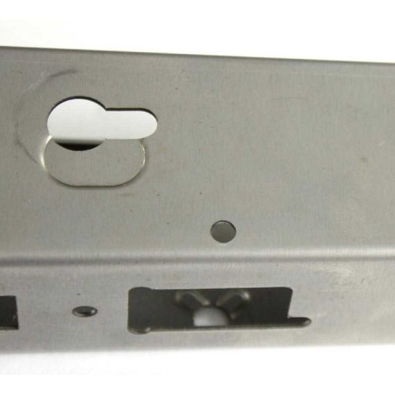 Close-up of AK receiver flat in the white, showing formed selector cutout and lower bend details.