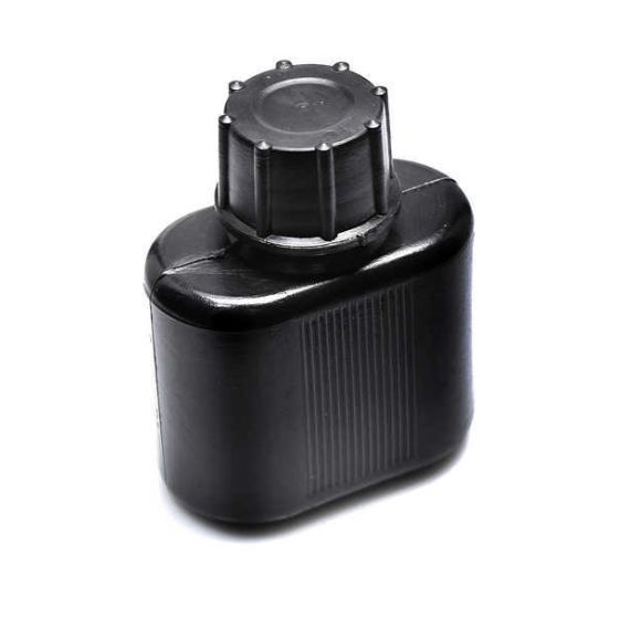 Angled view of new black Bulgarian Ak47/74 oil bottle, showing textured cap.