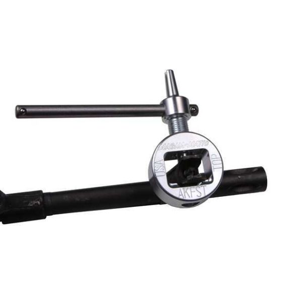 AK-Builder AKFST front sight tool installed on AK, showing Magna-Matic Defense engraved clamp and T-handle.