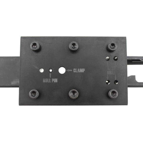 AK-Builder black oxide drilling fixture with laser-marked pin and selector lever holes on AK receiver.