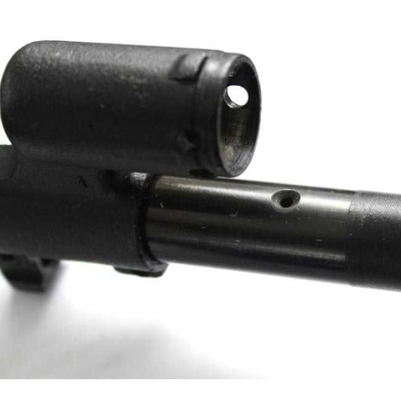 Close-up of black Bulgarian AK74 gas block and barrel with drilled gas port.
