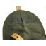 Close-up of textured olive drab canvas flap on Polish AKM magazine pouch, showing leather strap.
