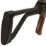 Angled view of black Polish Beryl AKM sidefolding stock mounted on receiver with ribbed buttpad.